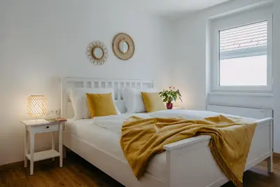 Ein Bett oder Betten in einem Zimmer der Unterkunft Auszeit Neusiedlersee