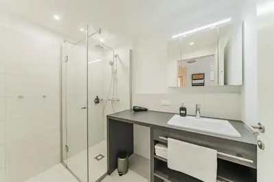 Ein Badezimmer in der Unterkunft Arbio I Liv's Place Lux Apartments