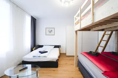 Ein Bett oder Betten in einem Zimmer der Unterkunft CozyNite Premium Apartment Schönbrunn 1
