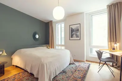 Ein Bett oder Betten in einem Zimmer der Unterkunft Ideal for Families & Mid-Term-Stays