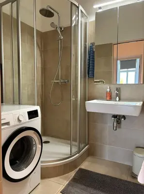 Ein Badezimmer in der Unterkunft Casa Nostra - Moderne lichtdurchflutete Wohnung am Augarten