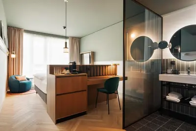 Ein Bett oder Betten in einem Zimmer der Unterkunft Hotel Galántha