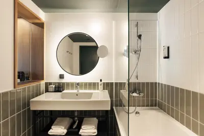 Ein Badezimmer in der Unterkunft Hotel Galántha