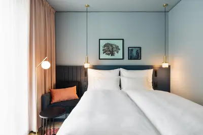 Ein Bett oder Betten in einem Zimmer der Unterkunft Hotel Galántha