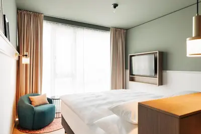 Ein Bett oder Betten in einem Zimmer der Unterkunft Hotel Galántha