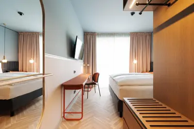 Ein Bett oder Betten in einem Zimmer der Unterkunft Hotel Galántha