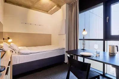 Ein Bett oder Betten in einem Zimmer der Unterkunft District Living