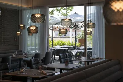 Ein Sitzbereich in der Unterkunft Hotel Le Parc