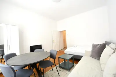 Ein Sitzbereich in der Unterkunft UNIVERSUM APARTMENT 4