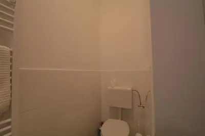 Ein Badezimmer in der Unterkunft UNIVERSUM APARTMENT 4
