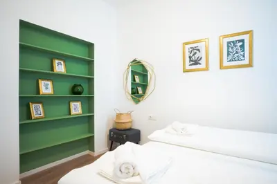 Ein Bett oder Betten in einem Zimmer der Unterkunft Bright boutique apartment located 15 min from Stephansdom