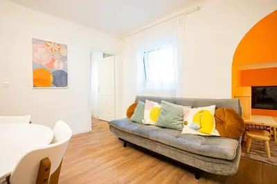 Ein Sitzbereich in der Unterkunft Bright boutique apartment located 15 min from Stephansdom