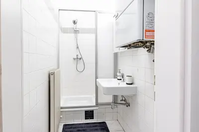 Ein Badezimmer in der Unterkunft MODERN VIENNA by JR City Apartments