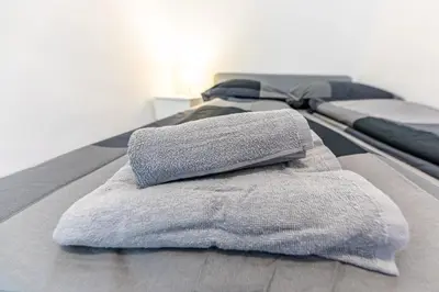 Ein Bett oder Betten in einem Zimmer der Unterkunft MODERN VIENNA by JR City Apartments