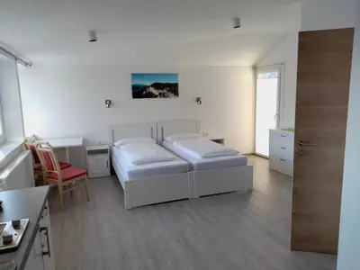 Ein Bett oder Betten in einem Zimmer der Unterkunft Gasthof Mohr