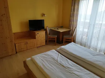 Ein Bett oder Betten in einem Zimmer der Unterkunft Gasthof Mohr