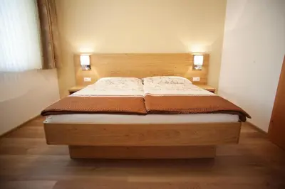 Ein Bett oder Betten in einem Zimmer der Unterkunft Gästehaus & Weingut Johannes Strudler