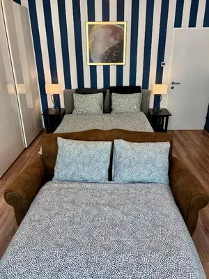 Ein Bett oder Betten in einem Zimmer der Unterkunft Adele Blue Danube (10 min to Center)