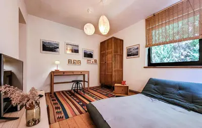 Ein Bett oder Betten in einem Zimmer der Unterkunft Ferienhaus-Wiendonaustadt