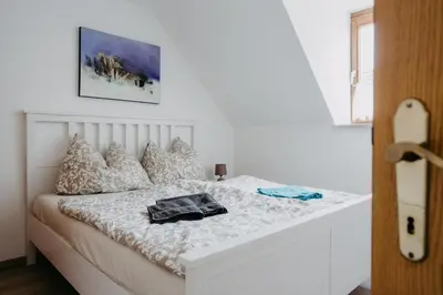 Ein Bett oder Betten in einem Zimmer der Unterkunft Ferienhaus in historischer Hofgasse