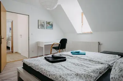 Ein Bett oder Betten in einem Zimmer der Unterkunft Ferienhaus in historischer Hofgasse
