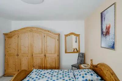 Ein Bett oder Betten in einem Zimmer der Unterkunft Ferienhaus RADO