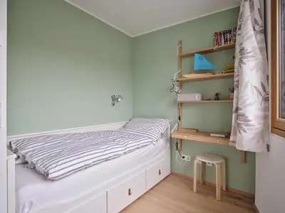 Ein Bett oder Betten in einem Zimmer der Unterkunft Exklusives Ferienhaus - Direkt am Neusiedler See