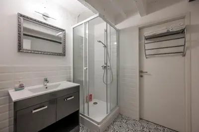 Ein Badezimmer in der Unterkunft City Center Lofts