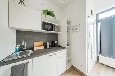 Küche/Küchenzeile in der Unterkunft City Center Lofts