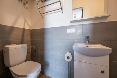 Ein Badezimmer in der Unterkunft City Center Lofts