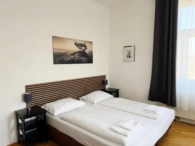 Ein Bett oder Betten in einem Zimmer der Unterkunft Buchengasse Apartment Vienna - Free Highspeed-Internet