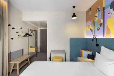 Ein Bett oder Betten in einem Zimmer der Unterkunft Spark by Hilton Vienna Donaustadt