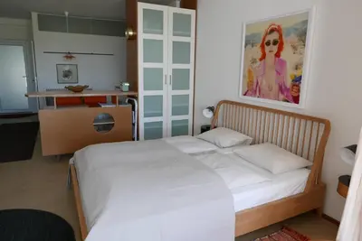 Ein Bett oder Betten in einem Zimmer der Unterkunft Studio-Apartment