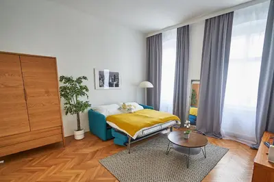 Ein Bett oder Betten in einem Zimmer der Unterkunft Renovated & Cozy - Close to Museumsquartier