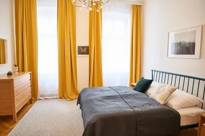 Ein Bett oder Betten in einem Zimmer der Unterkunft Renovated & Cozy - Close to Museumsquartier