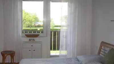 Ein Bett oder Betten in einem Zimmer der Unterkunft Appartement am Strand