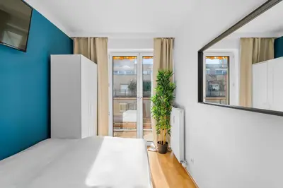 Ein Bett oder Betten in einem Zimmer der Unterkunft Flora Collection