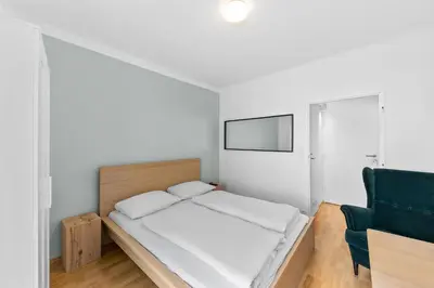Ein Bett oder Betten in einem Zimmer der Unterkunft Flora Collection
