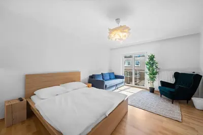 Ein Bett oder Betten in einem Zimmer der Unterkunft Flora Collection