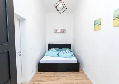 Ein Bett oder Betten in einem Zimmer der Unterkunft Sunshine by prater