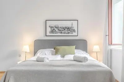 Ein Bett oder Betten in einem Zimmer der Unterkunft Attractive 2 BR Apt near Vienna AKH Ideal for All