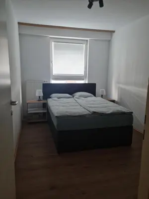 Ein Bett oder Betten in einem Zimmer der Unterkunft Uschi's Home