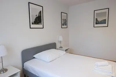 Ein Bett oder Betten in einem Zimmer der Unterkunft Retro Apartment in the city center.