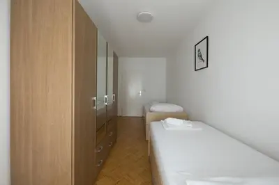 Ein Bett oder Betten in einem Zimmer der Unterkunft Retro Apartment in the city center.