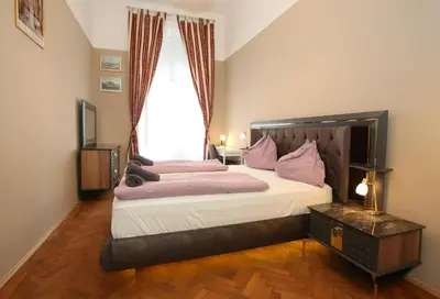 Ein Bett oder Betten in einem Zimmer der Unterkunft Apartments Vienna Opera