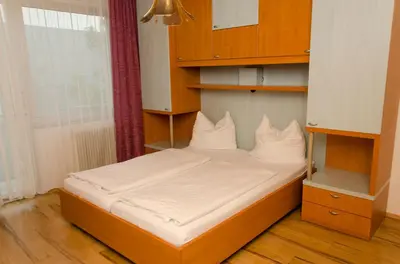 Ein Bett oder Betten in einem Zimmer der Unterkunft Gästehaus Herlinde