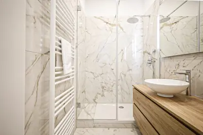 Ein Badezimmer in der Unterkunft HeyMi Apartments Zentagasse