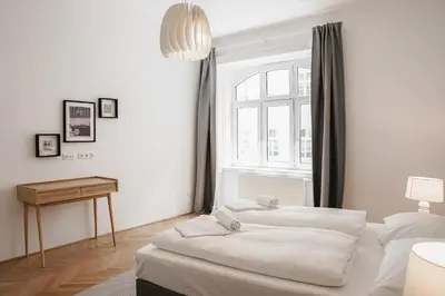 Ein Bett oder Betten in einem Zimmer der Unterkunft HeyMi Apartments Zentagasse