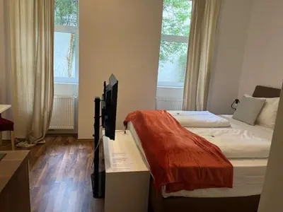 Ein Bett oder Betten in einem Zimmer der Unterkunft Grand Central Station Apartments I contactless check-in