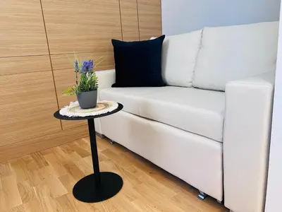 Ein Sitzbereich in der Unterkunft ZEUS Design Apartment Erlach #37